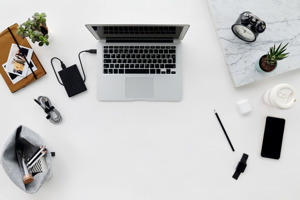 Work table in Scandinavian style with the laptop on it 