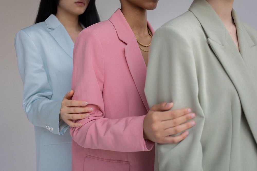 3 women represent a jacket brand