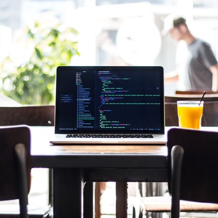 Freelance web developer working with code