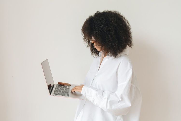Content creator with the laptop is looking for a sponsor 