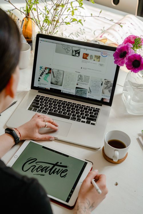 Freelance graphic designer working at her laptop